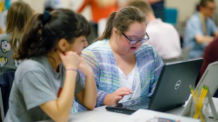 Two students at a table