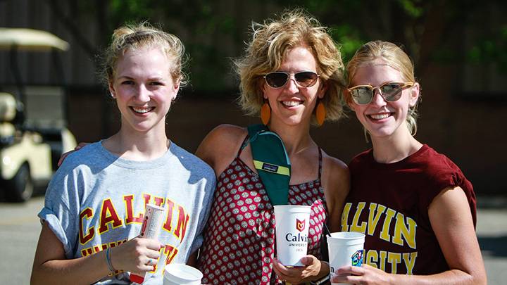 Alumna Lauri Hanenburg with Calvin University students