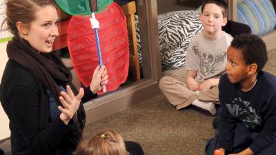 Jill Hutchison, a special education major, works with students at Grand Rapids Christian Elementary.