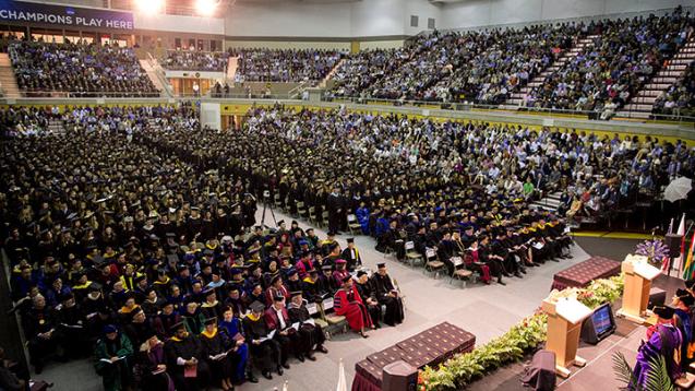 The Class of 2017 surrounded by parents and friends in the fieldhouse arena.