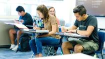 Students taking a test in a Calvin University classroom