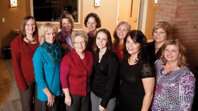 Dr. Laura Champion with the staff of Calvin's health services.