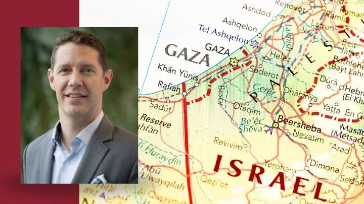 A man in suit coat's headshot inset over a map of Israel